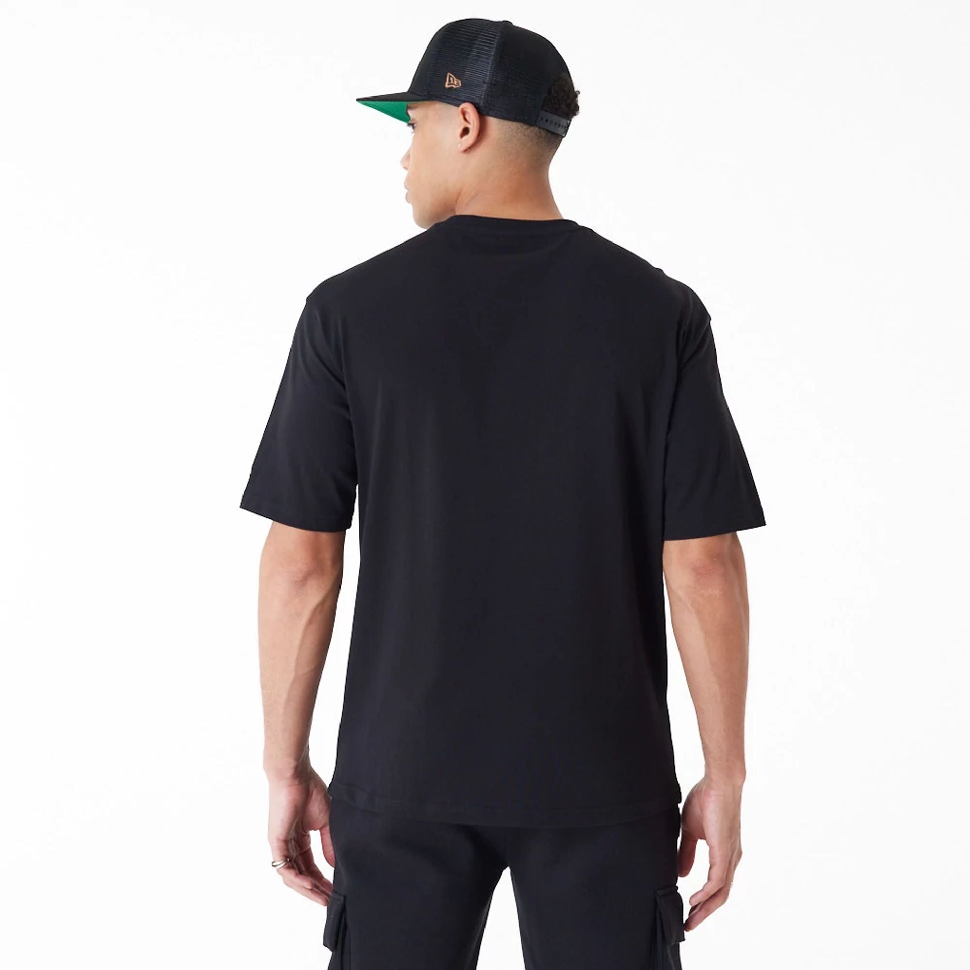 The Male model is wearing New Era Flag Black Oversized T-Shirt 2