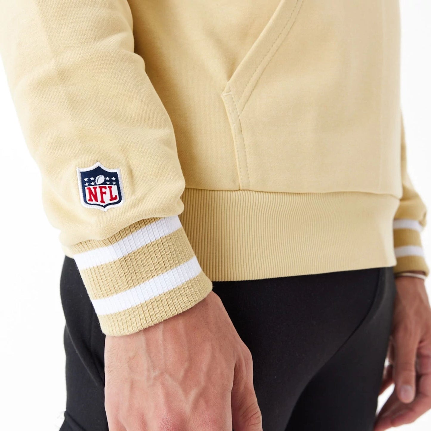 The Male model is wearing New Orleans Saints NFL Stone Oversized Pullover Hoodie 6