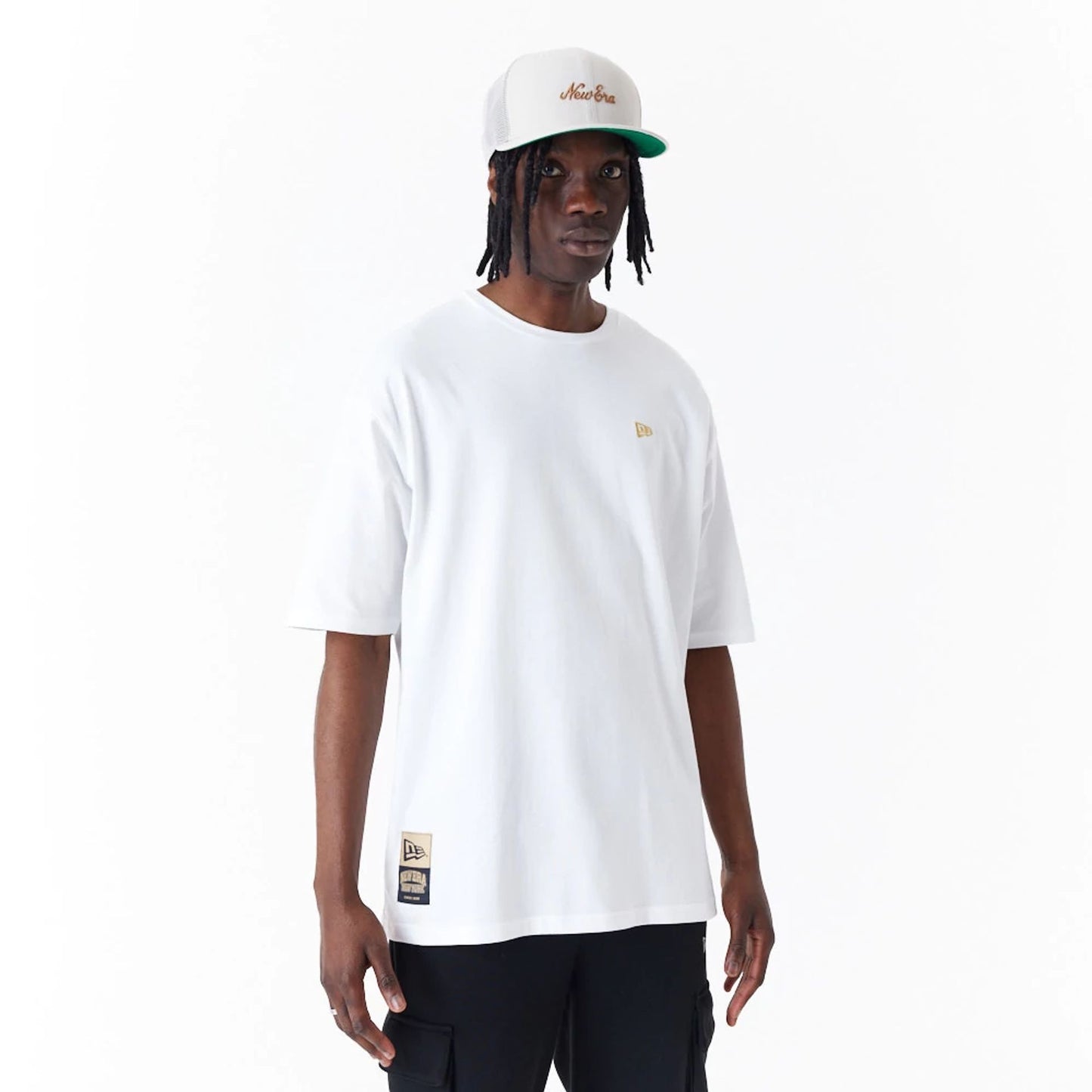 The Male model is wearing New Era Sticker White Oversized T-Shirt 4