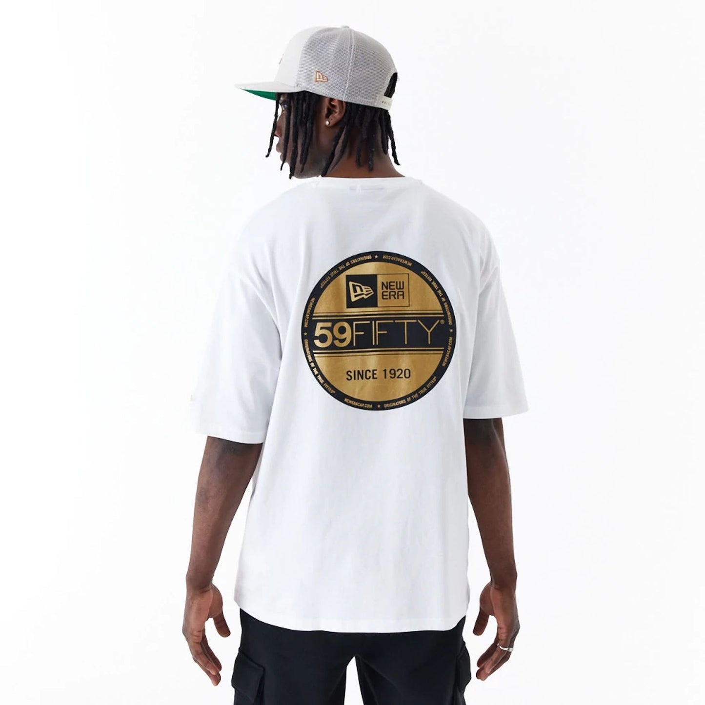 The Male model is wearing New Era Sticker White Oversized T-Shirt 1