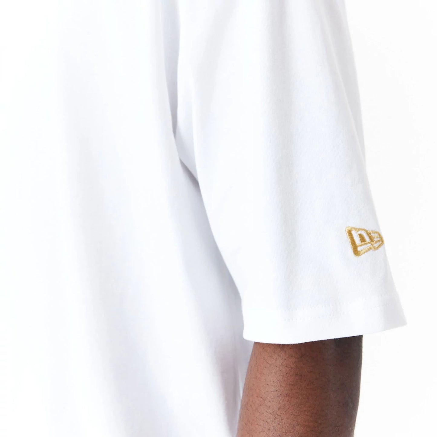 The Male model is wearing New Era Sticker White Oversized T-Shirt 2