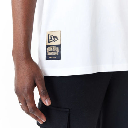 The Male model is wearing New Era Sticker White Oversized T-Shirt 3