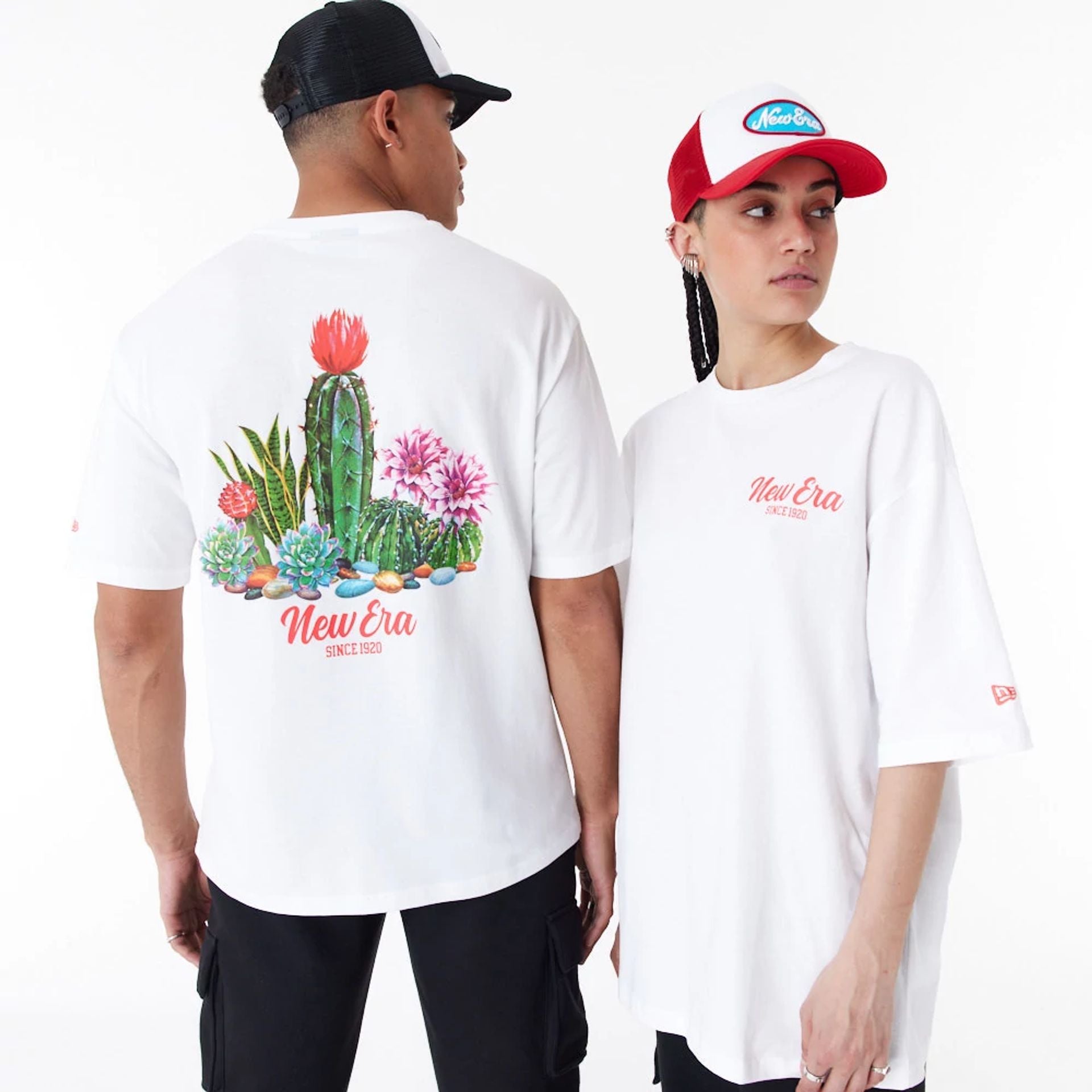 The Male model is wearing New Era Cactus Graphic White Oversized T-Shirt 1