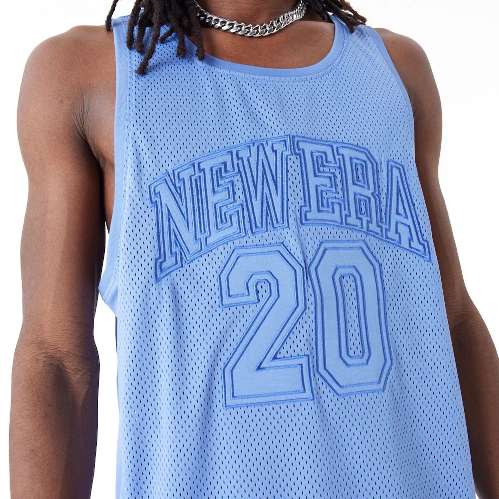 The Male model is wearing New Era Arch Logo Blue Mesh Tank Top 9