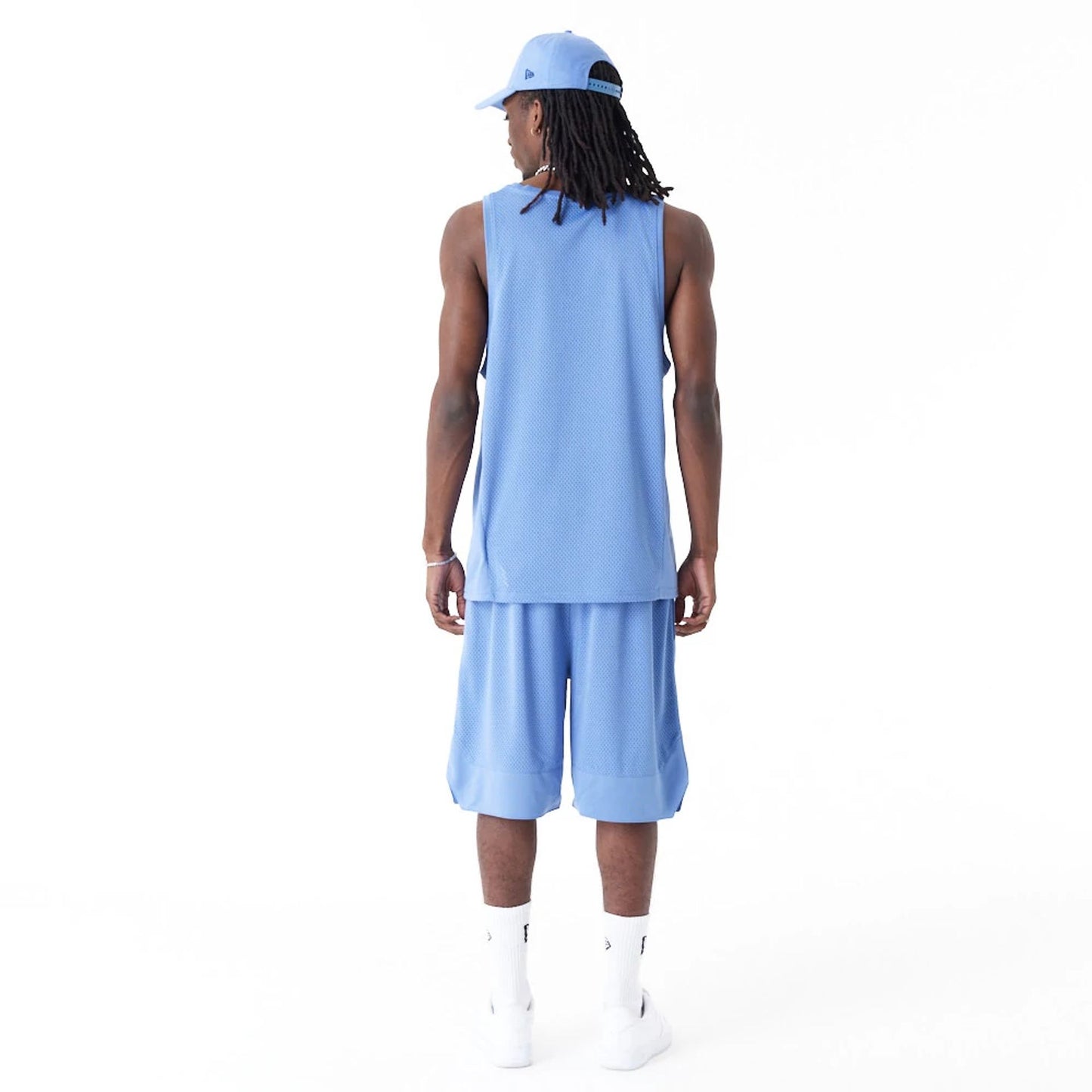 The Male model is wearing New Era Arch Logo Blue Mesh Tank Top 5