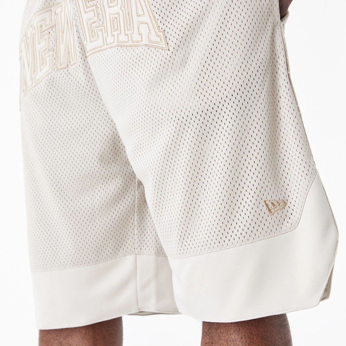 The Male model is wearing New Era Arch Logo Stone Mesh Shorts 5