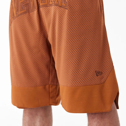 The Male model is wearing New Era Arch Logo Brown Mesh Shorts 4