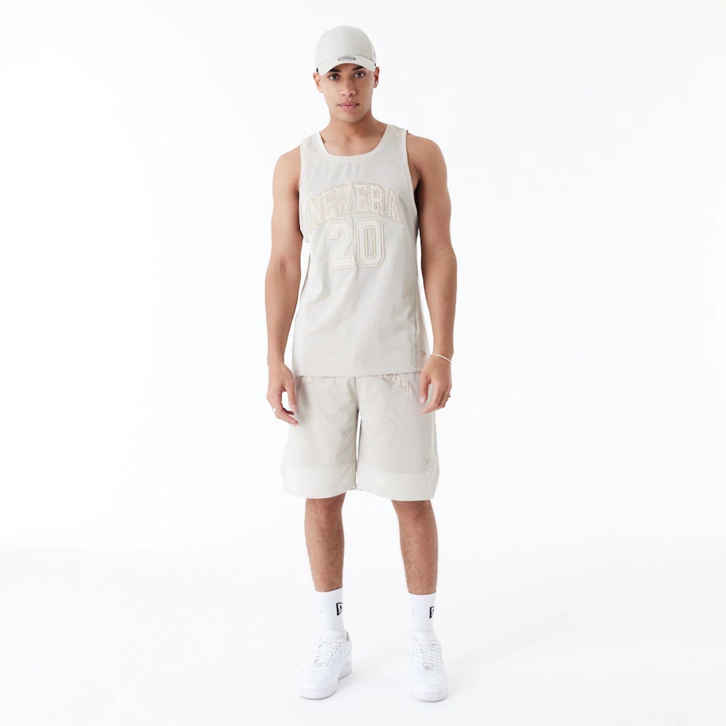 The Male model is wearing New Era Arch Logo Stone Mesh Tank Top 7