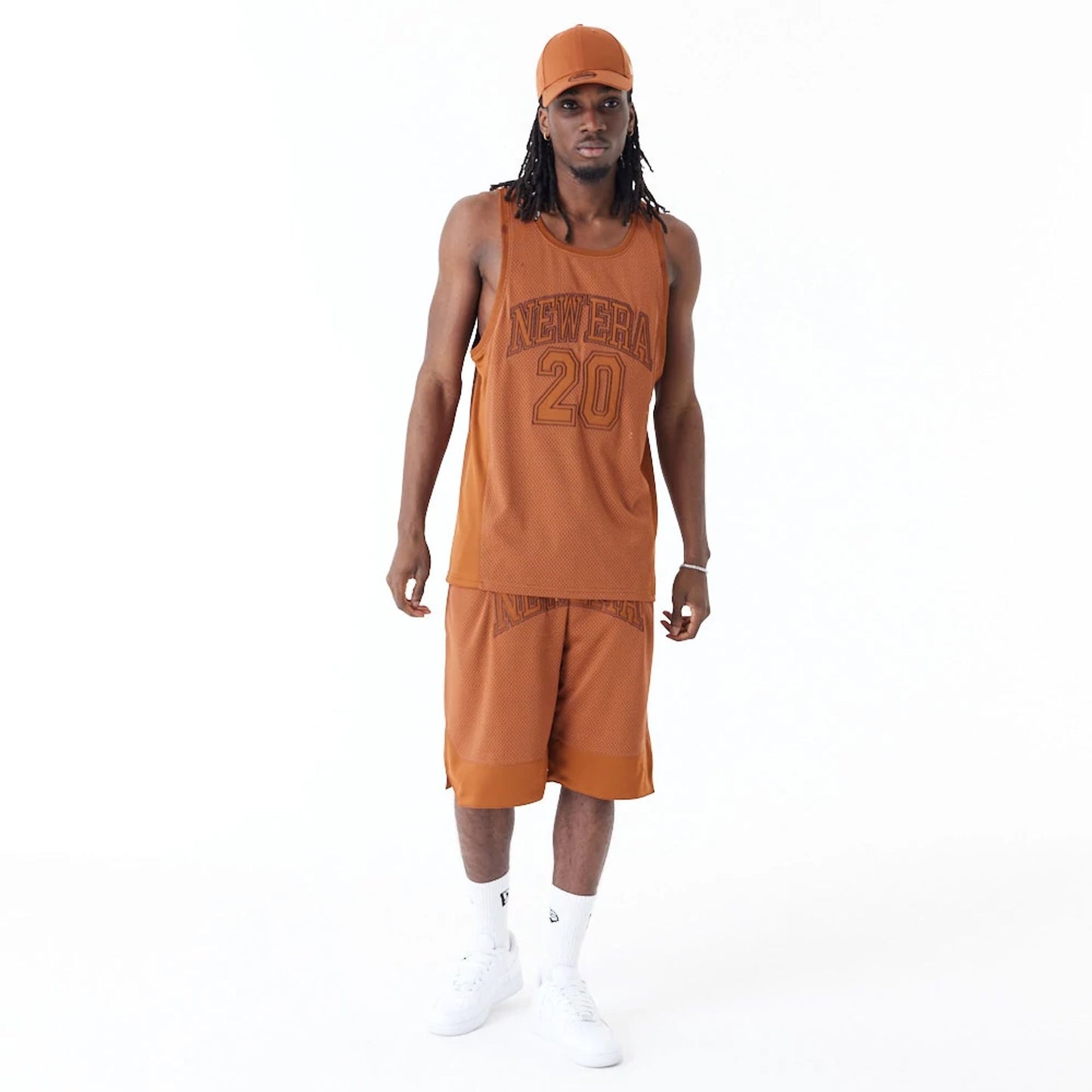 The Male model is wearing New Era Arch Logo Brown Mesh Tank Top 4