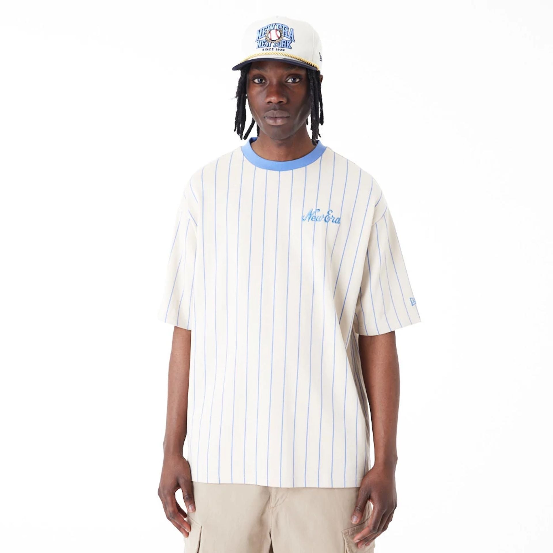 The Male model is wearing New Era Pinstripe Stone Oversized T-Shirt 1