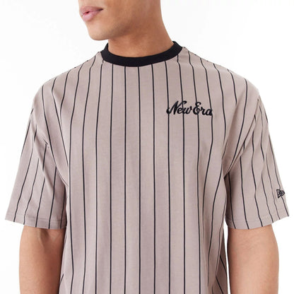 The Male model is wearing New Era Pinstripe Brown Oversized T-Shirt 6