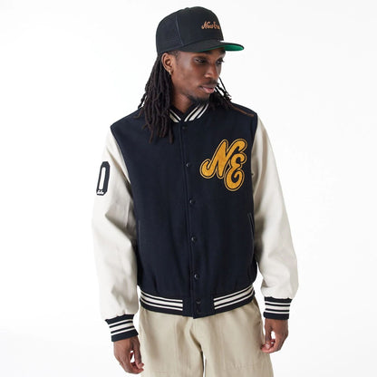 The Male model is wearing New Era Script Logo Black Varsity Jacket 1