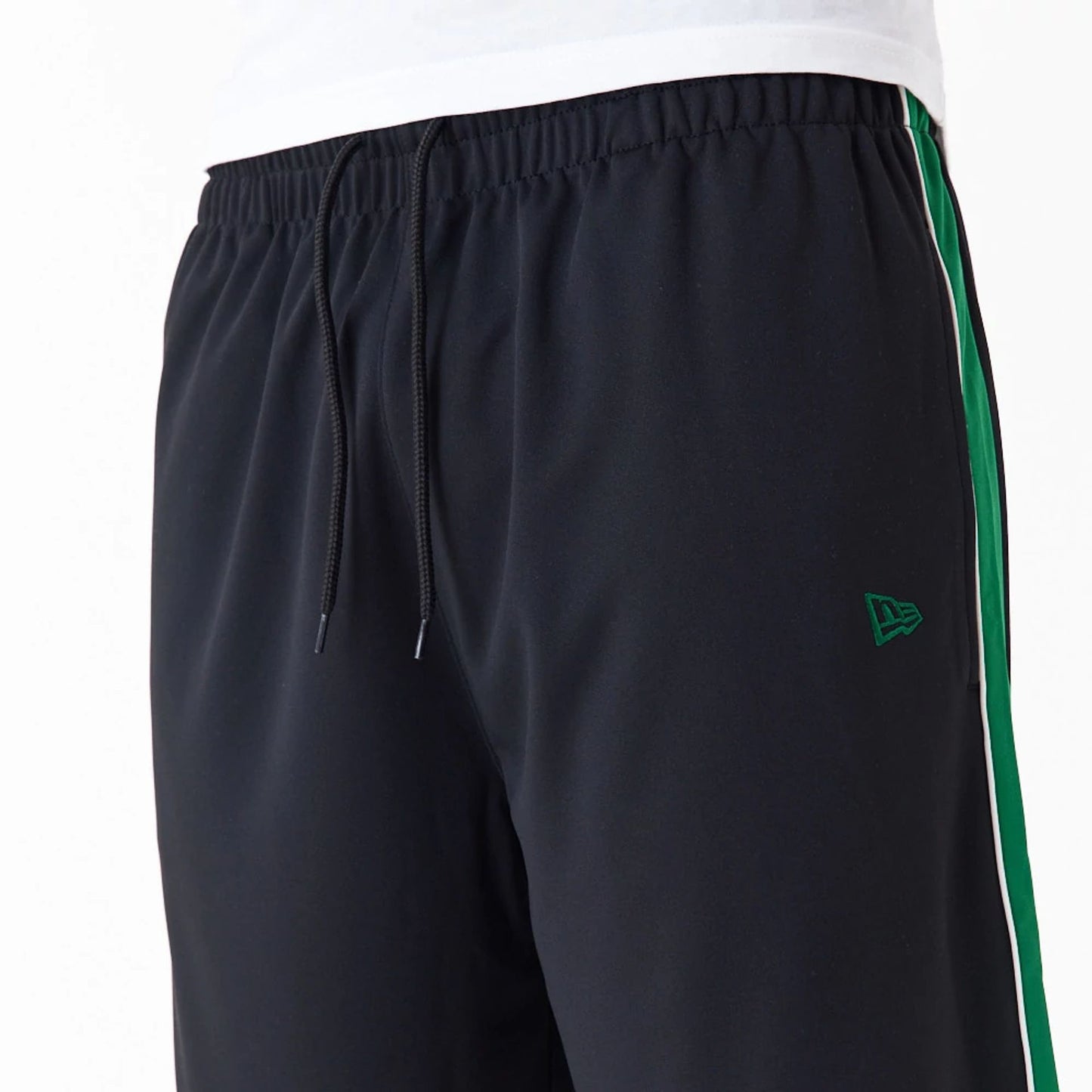 The Male model is wearing New Era Dark Green Panel Black Shorts 4