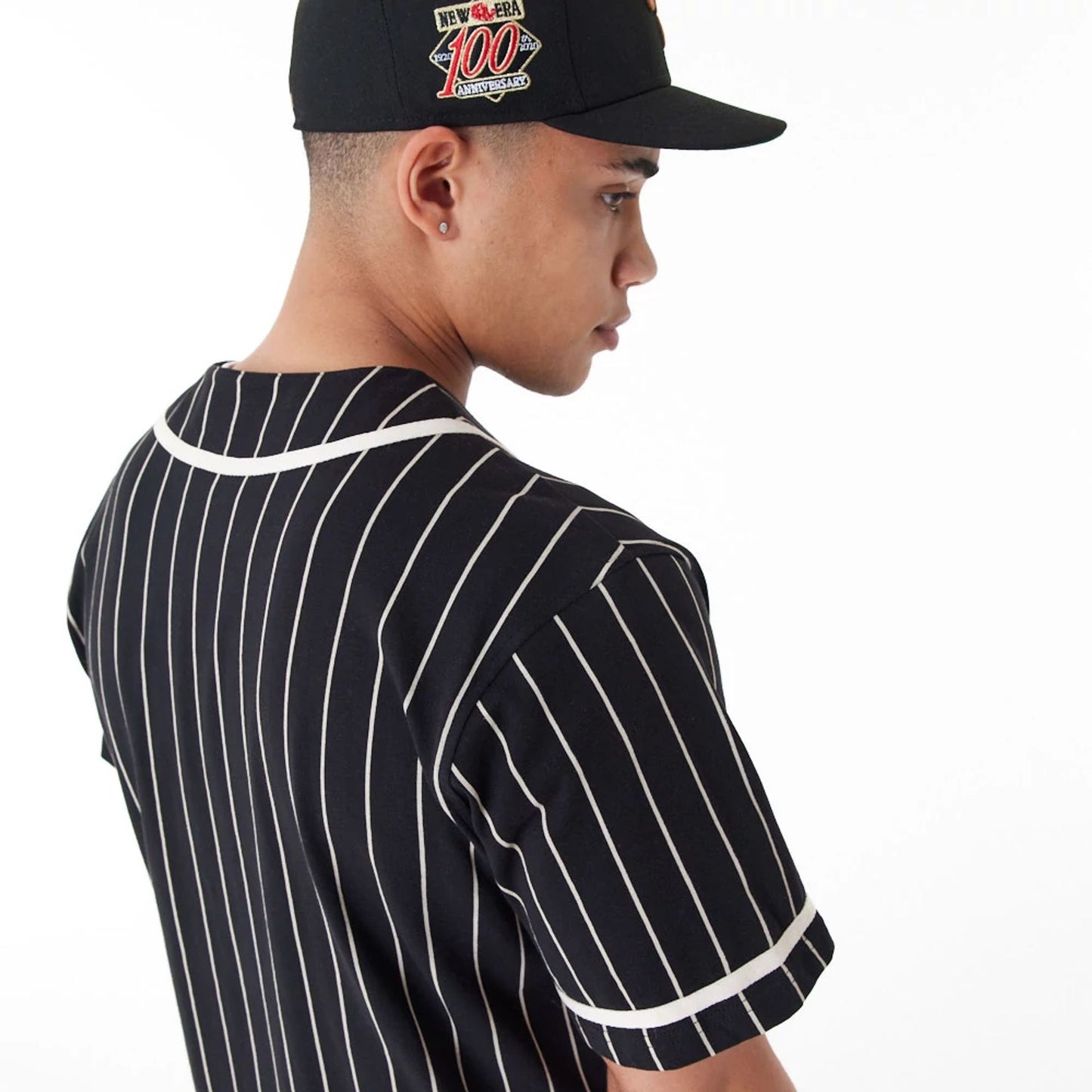 The Male model is wearing New Era Pinstripe Black Jersey 6