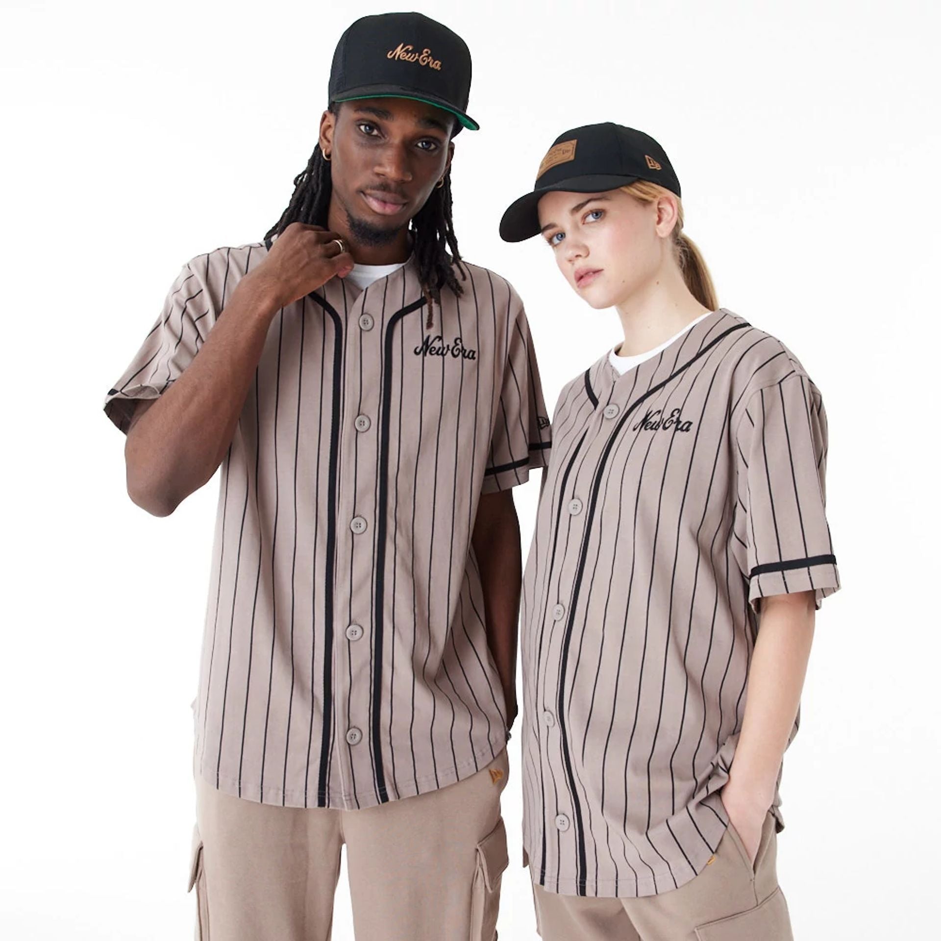 The Male model is wearing New Era Pinstripe Brown Jersey 1