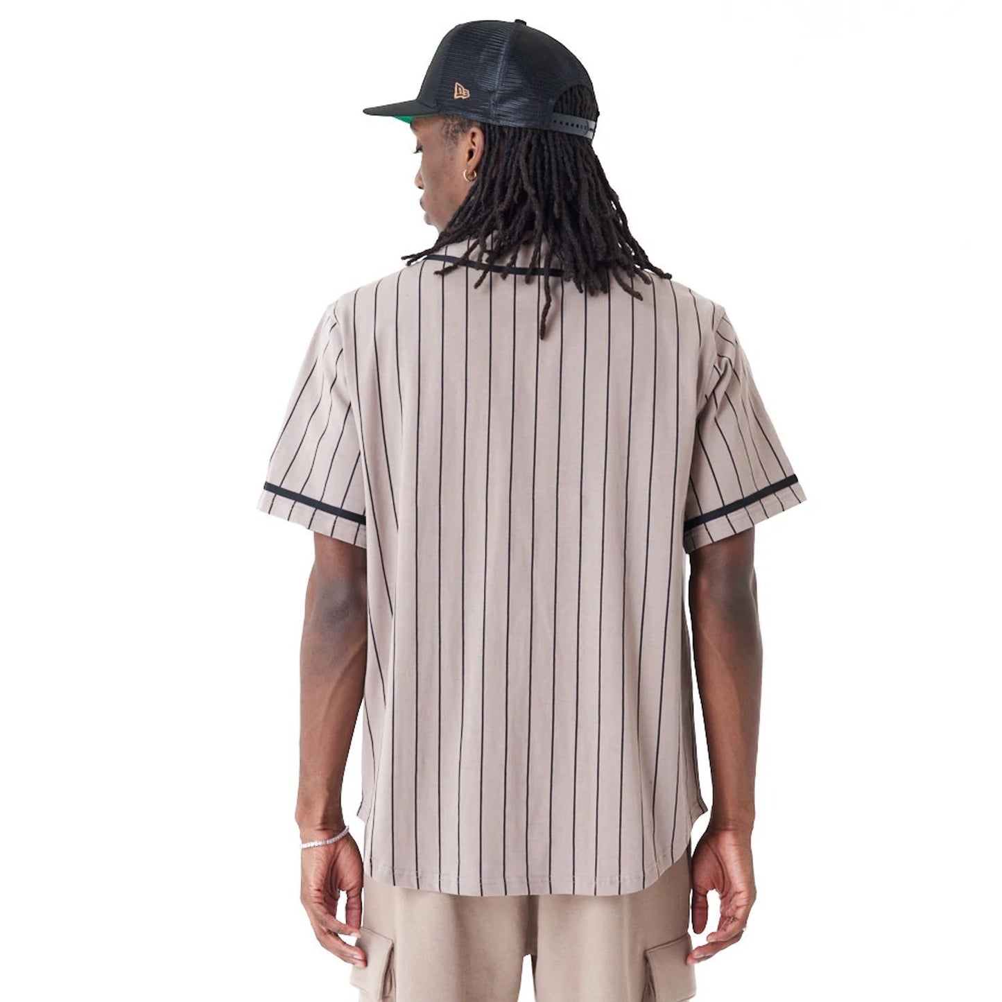 The Male model is wearing New Era Pinstripe Brown Jersey 3