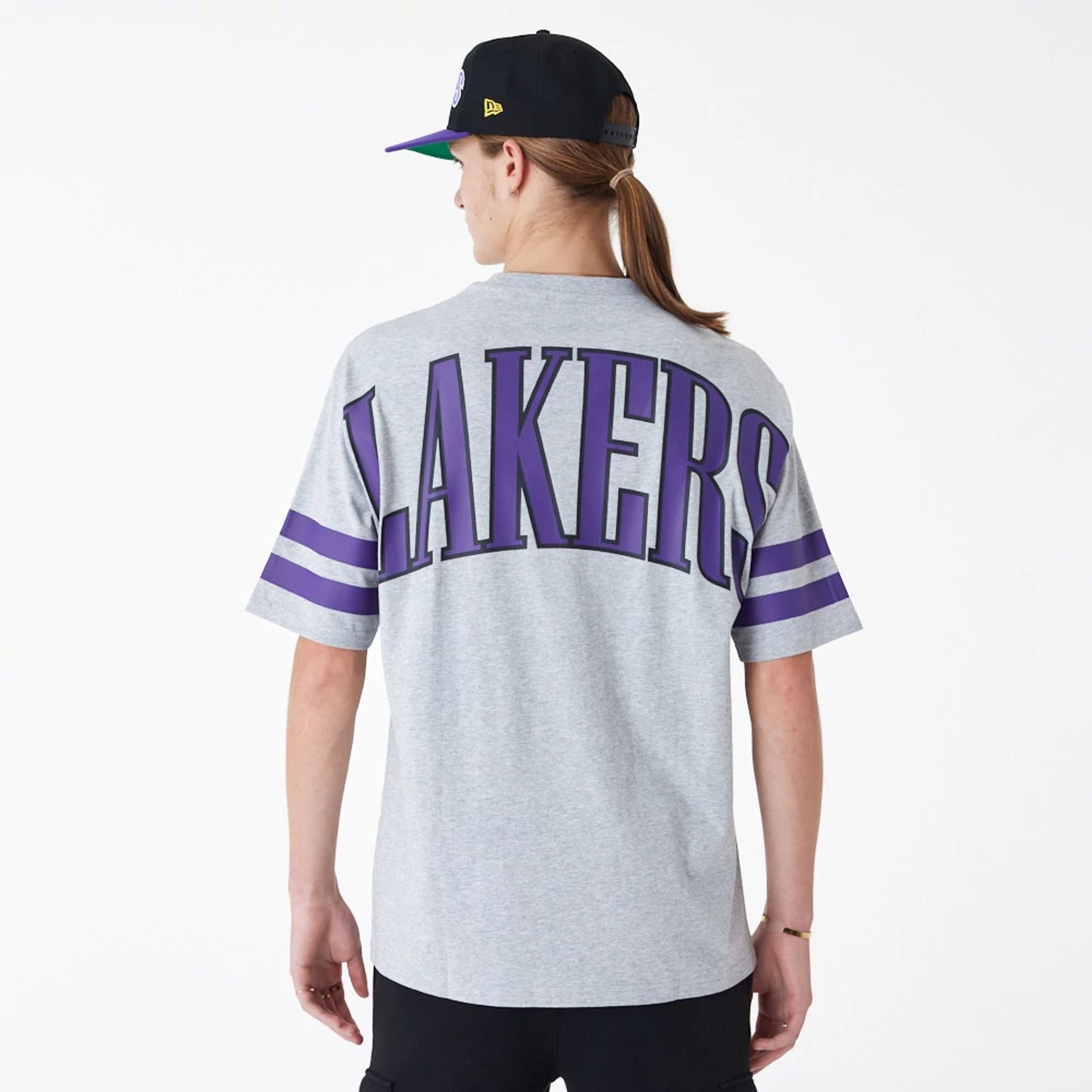 The Male model is wearing LA Lakers NBA Arch Graphic Grey Oversized T-Shirt 2