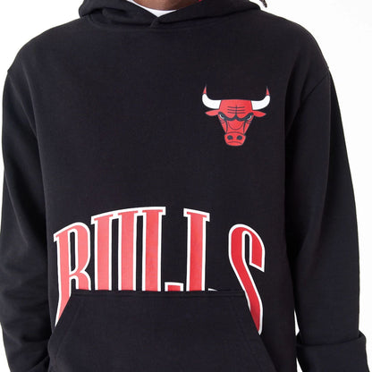 The Male model is wearing Chicago Bulls NBA Arch Graphic Black Oversized Pullover Hoodie 5