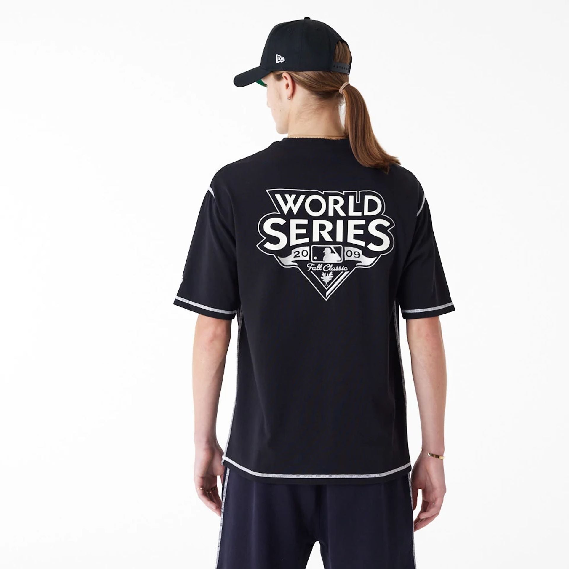 The Male model is wearing New York Yankees MLB World Series Black Oversized T-Shirt 2