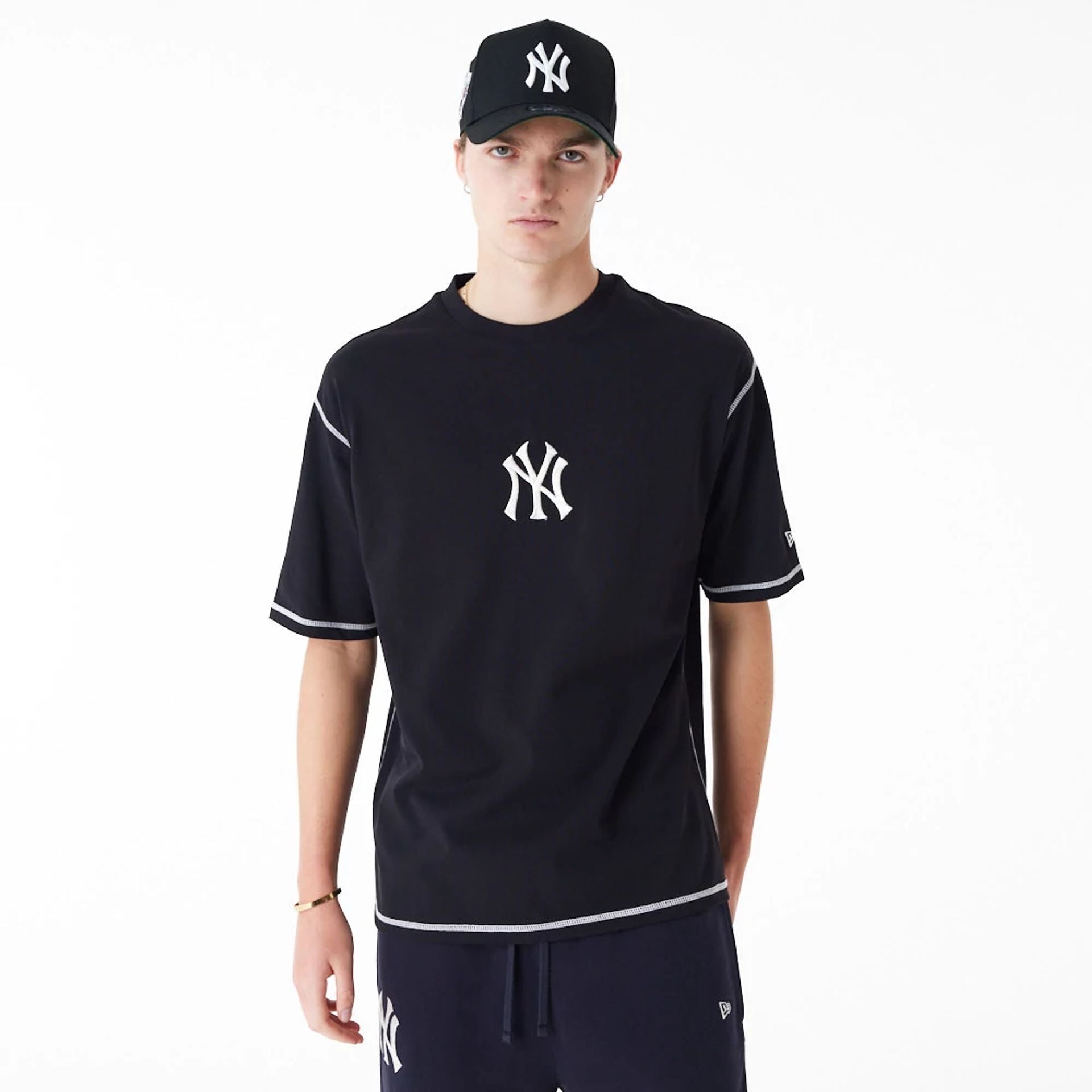 The Male model is wearing New York Yankees MLB World Series Black Oversized T-Shirt 1