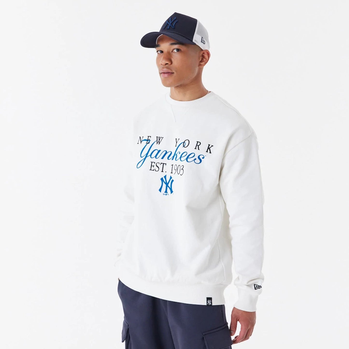 The Male model is wearing New York Yankees MLB Lifestyle Off White Crew Neck Sweatshirt 5