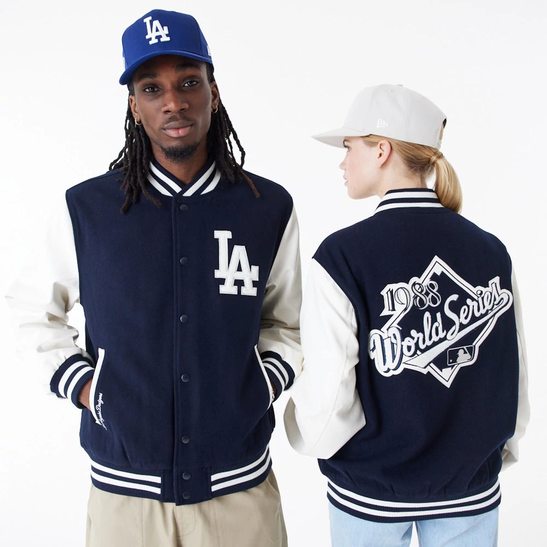 The Male model is wearing LA Dodgers MLB World Series Navy Varsity Jacket 1