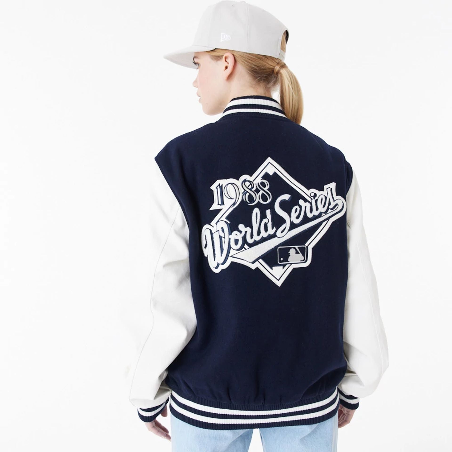 The Male model is wearing LA Dodgers MLB World Series Navy Varsity Jacket 2