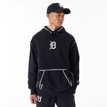 The Male model is wearing Detroit Tigers MLB World Series Black Oversized Pullover Hoodie 4