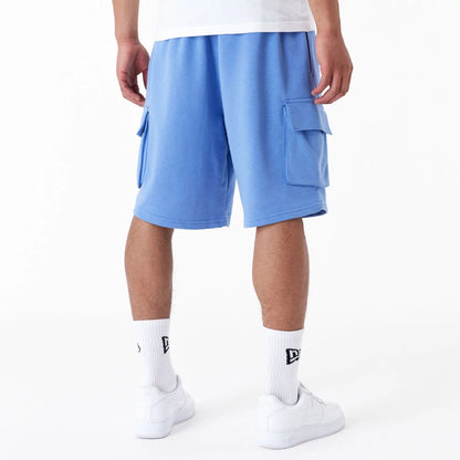 The Male model is wearing New Era Essential Blue Cargo Shorts 9