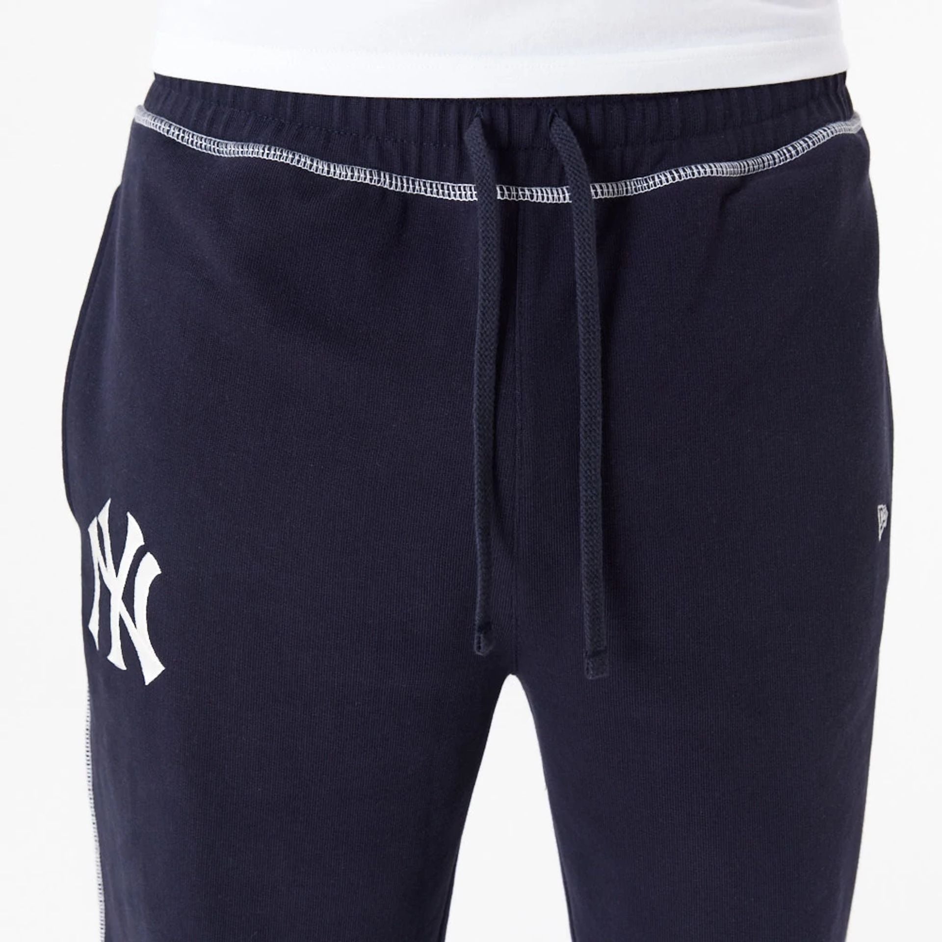 The Male model is wearing New York Yankees MLB Lifestyle Navy Joggers 7