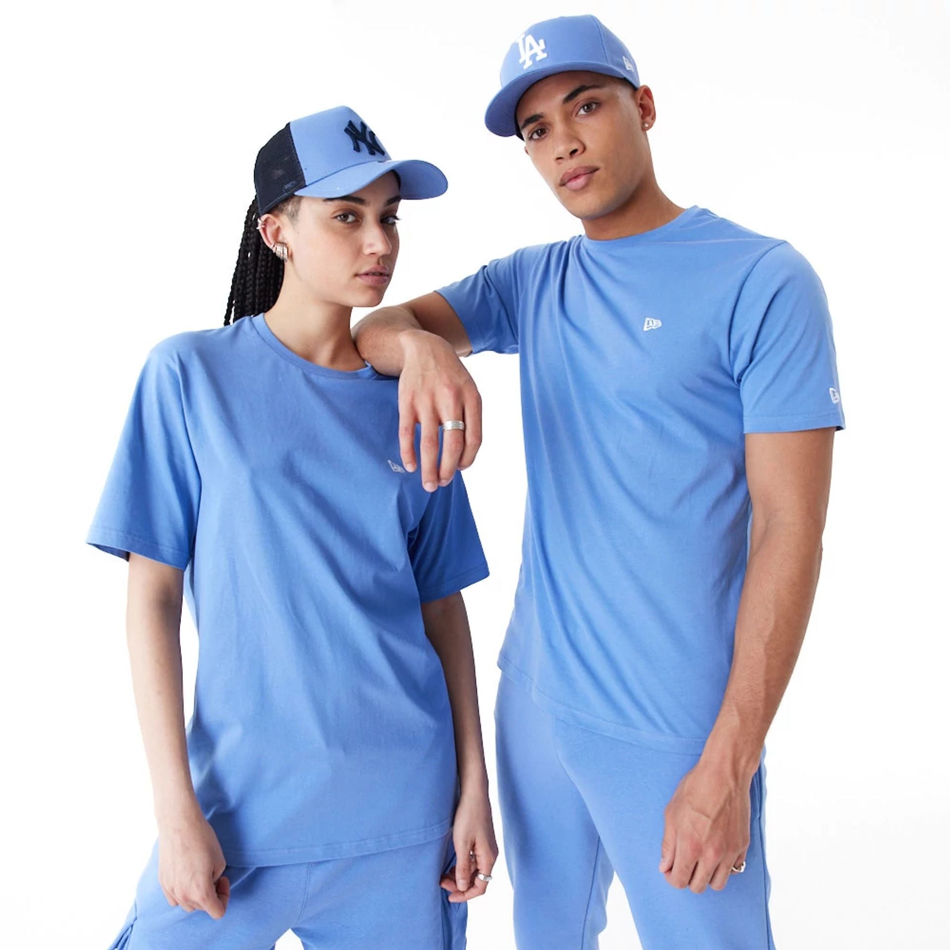 The Male model is wearing New Era Essential Blue T-Shirt 1