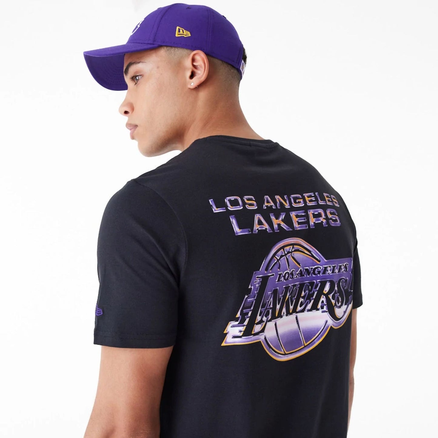 The Male model is wearing LA Lakers NBA Holographic Black Oversized T-Shirt 4