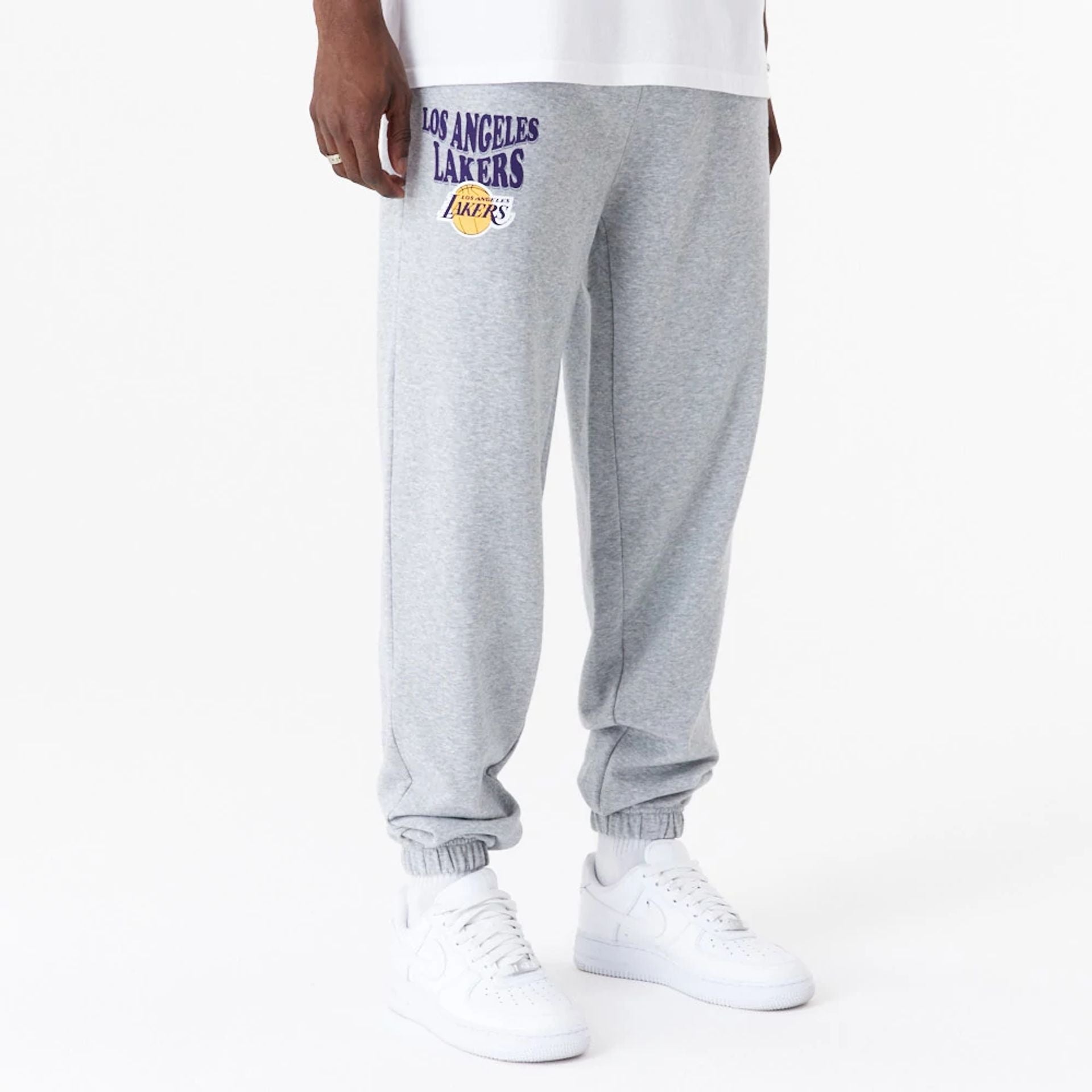 The Male model is wearing LA Lakers NBA Script Grey Relaxed Joggers 1