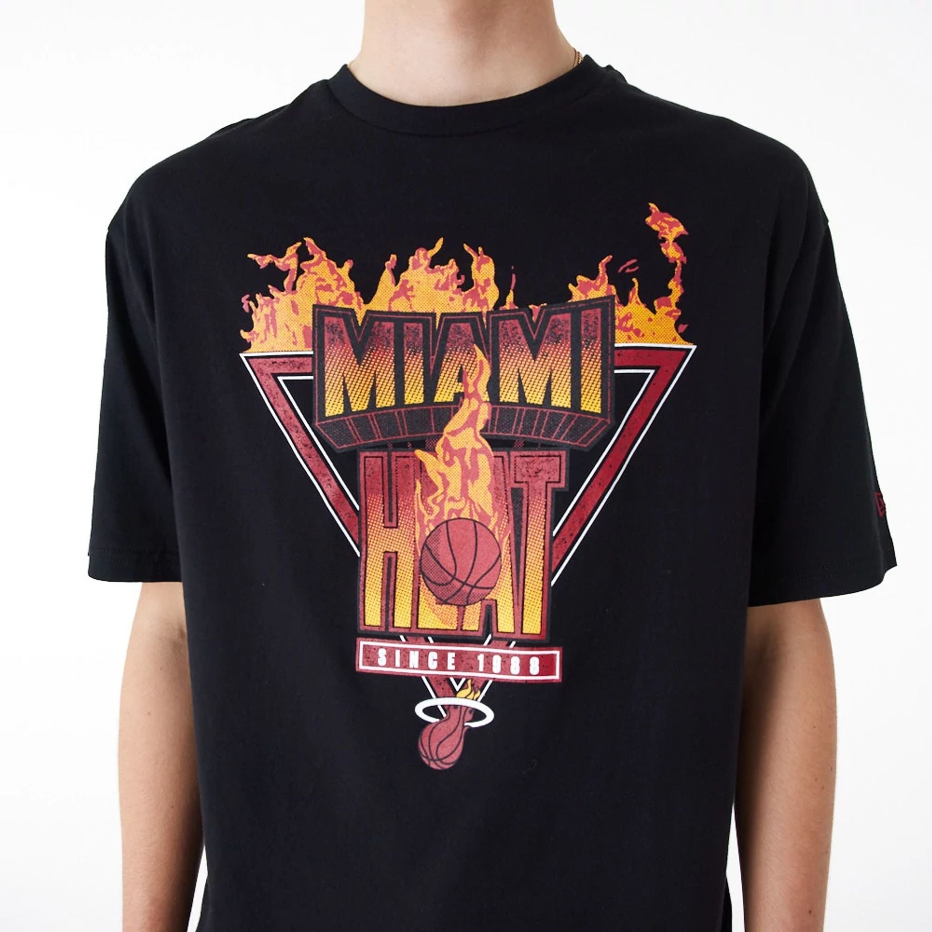 The Male model is wearing Miami Heat NBA Flame Graphic Black Oversized T-Shirt 2