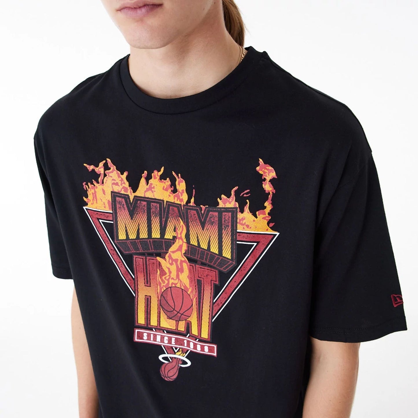 The Male model is wearing Miami Heat NBA Flame Graphic Black Oversized T-Shirt 4