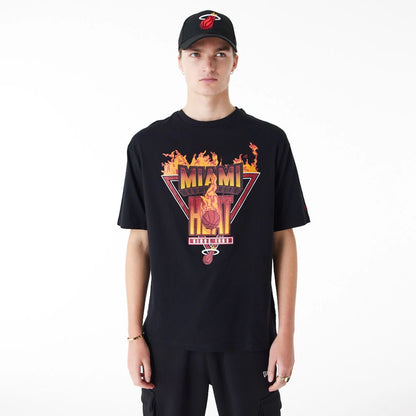 The Male model is wearing Miami Heat NBA Flame Graphic Black Oversized T-Shirt 1