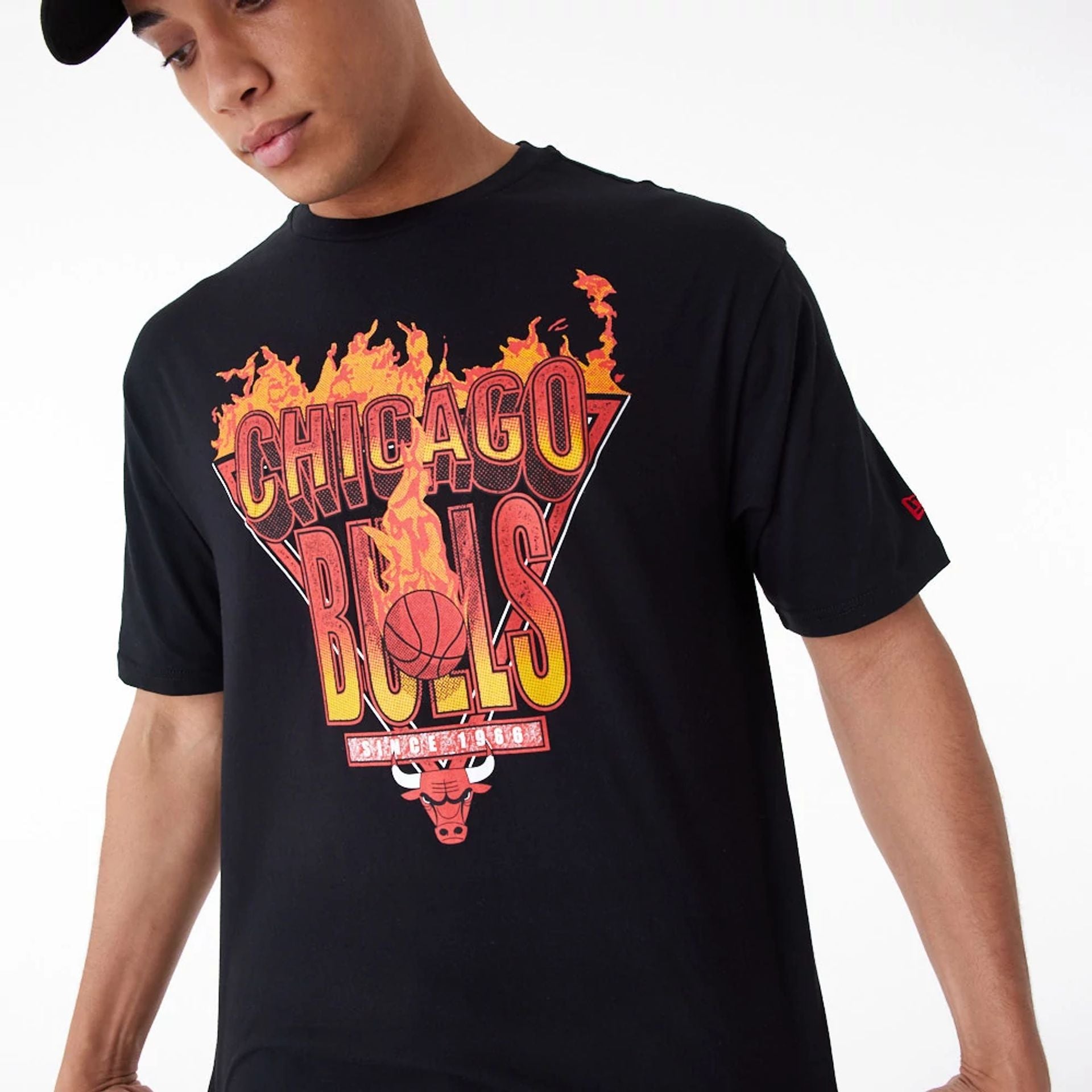 The Male model is wearing Chicago Bulls NBA Flame Graphic Black Oversized T-Shirt 2