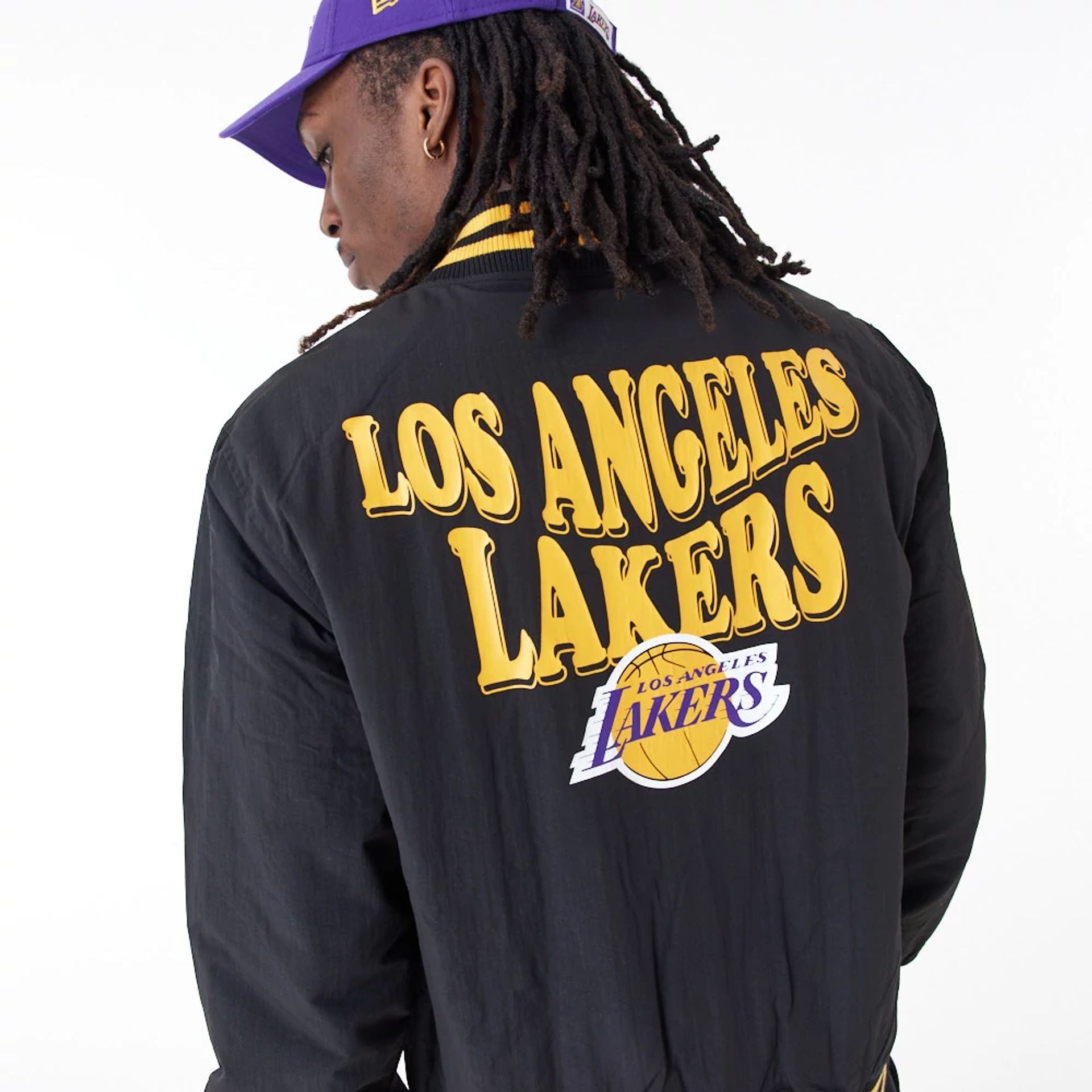 The Male model is wearing LA Lakers NBA Script Black Bomber Jacket 2