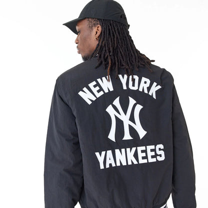 The Male model is wearing New York Yankees MLB Team Wordmark Black Bomber Jacket 2