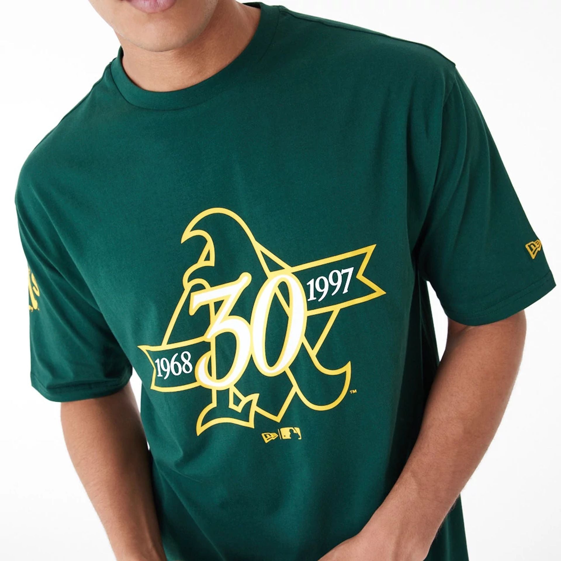 The Male model is wearing Oakland Athletics MLB Anniversary Green Oversized T-Shirt 2