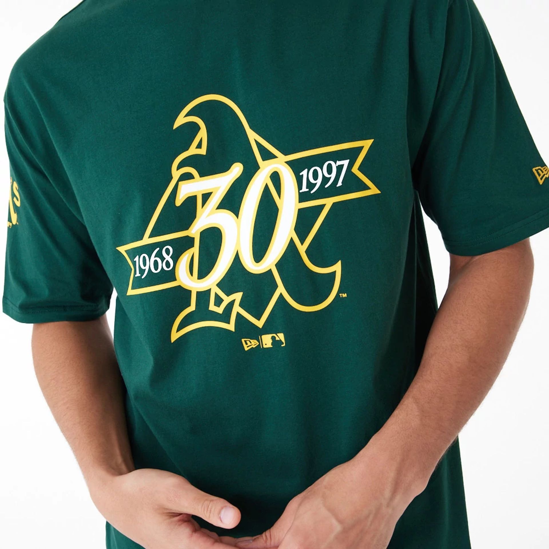 The Male model is wearing Oakland Athletics MLB Anniversary Green Oversized T-Shirt 5