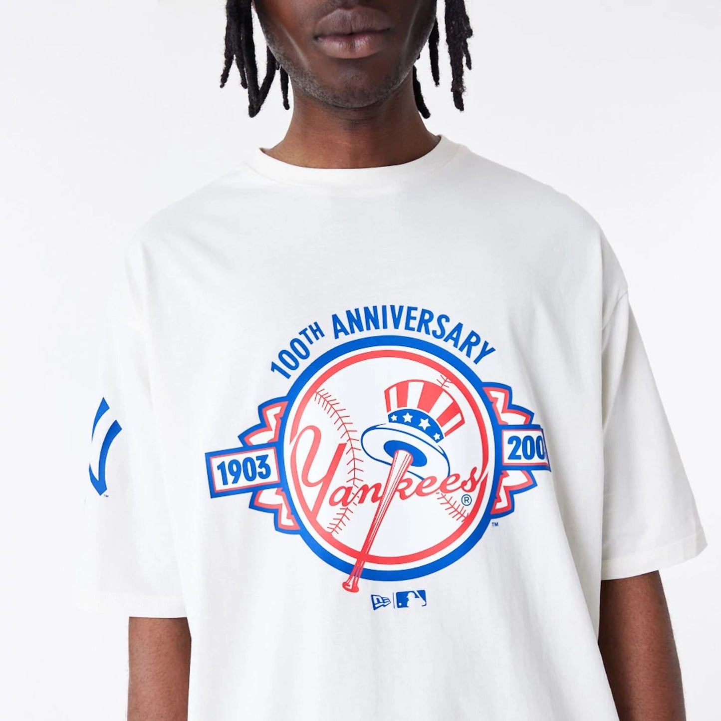 The Male model is wearing New York Yankees MLB Anniversary White Oversized T-Shirt 5