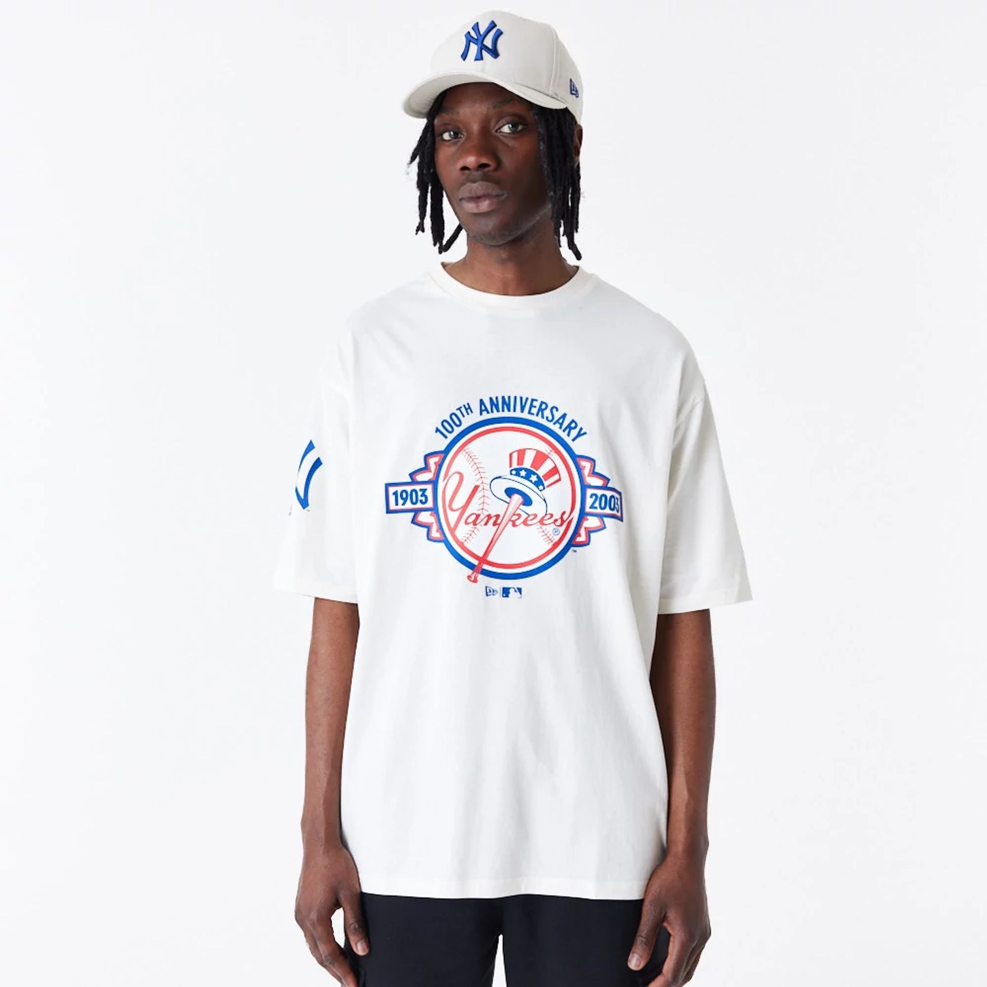 The Male model is wearing New York Yankees MLB Anniversary White Oversized T-Shirt 1