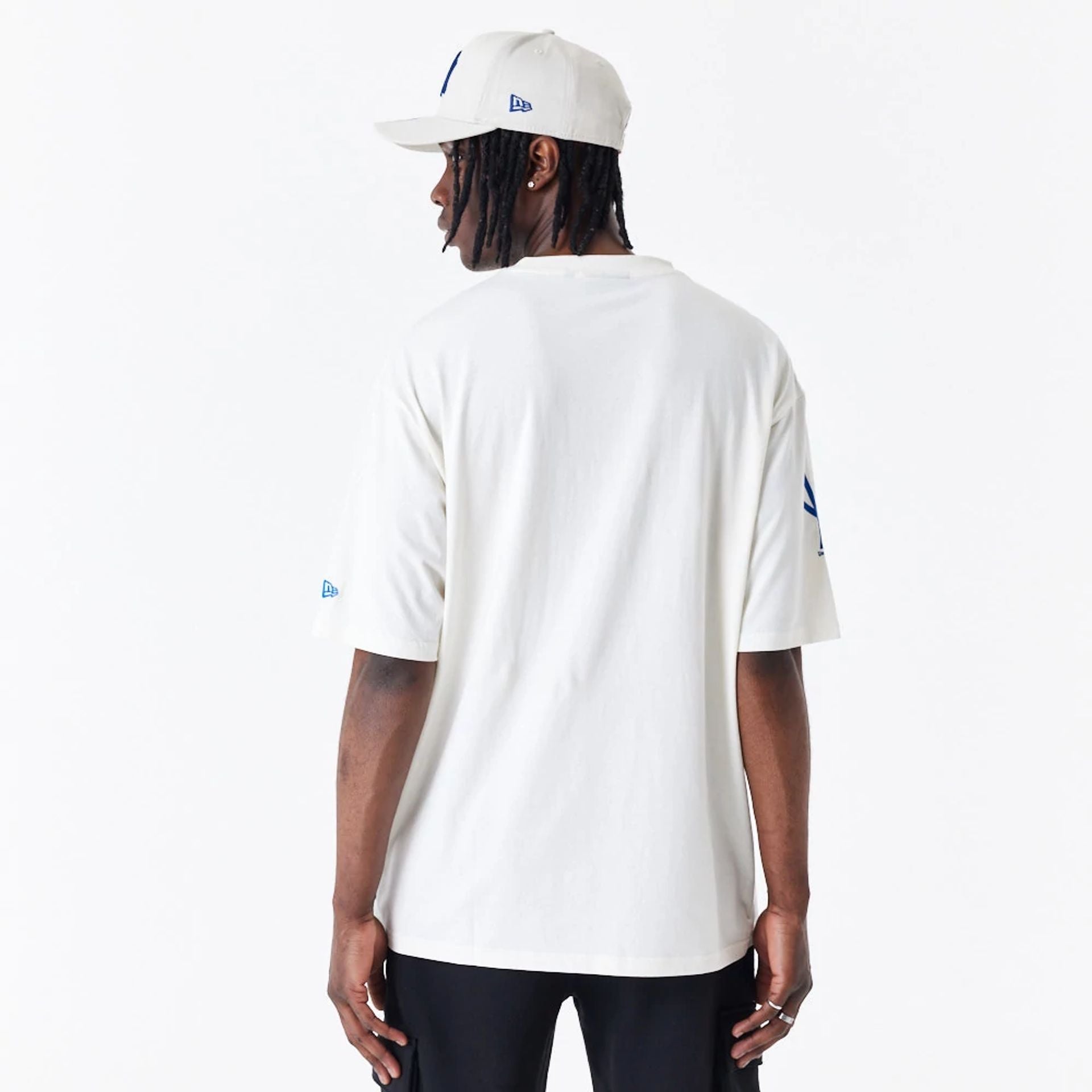 The Male model is wearing New York Yankees MLB Anniversary White Oversized T-Shirt 3