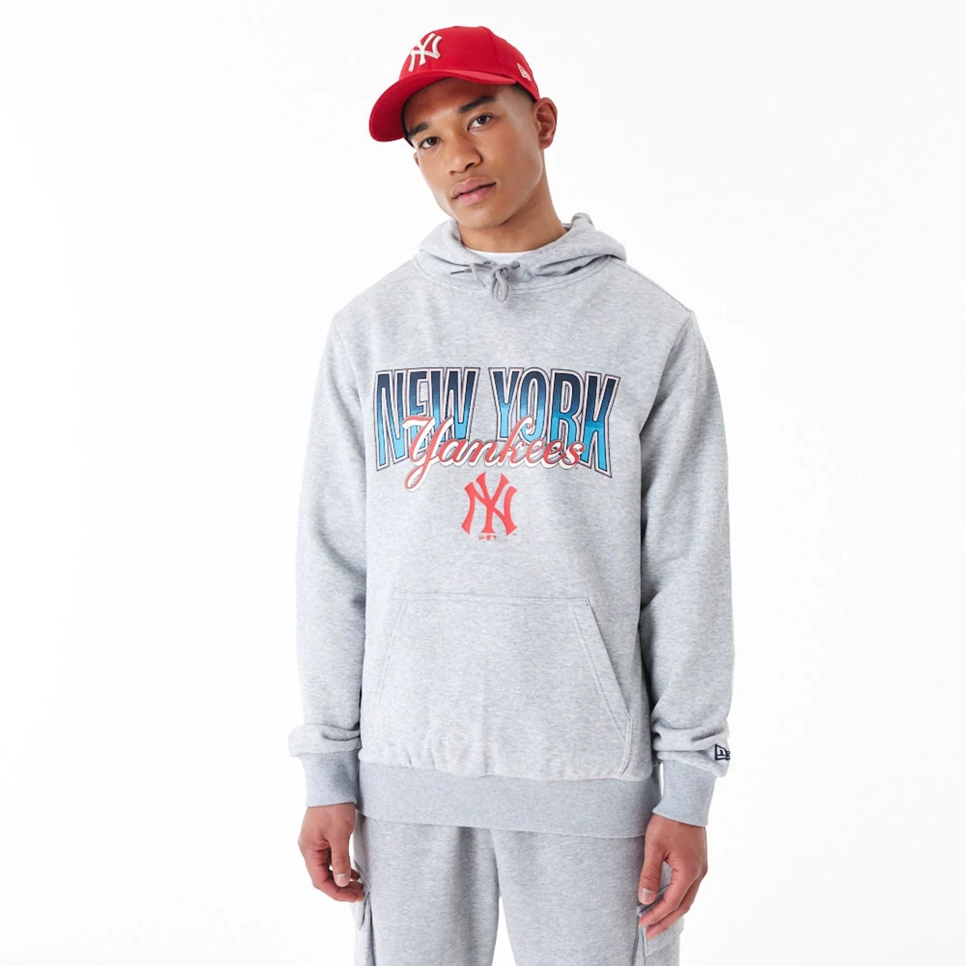 The Male model is wearing New York Yankees MLB Gradient Graphic Grey Pullover Hoodie 1