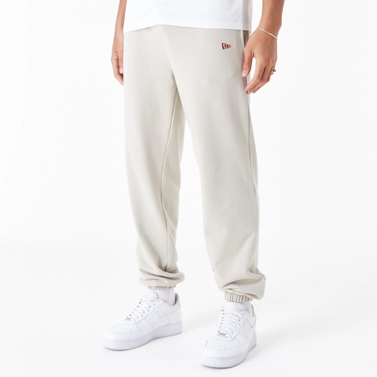 The Male model is wearing LA Dodgers League Essential Stone Joggers 6