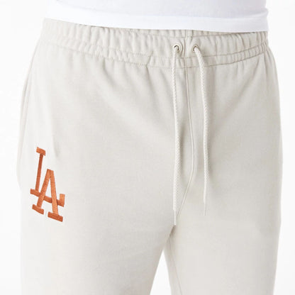 The Male model is wearing LA Dodgers League Essential Stone Joggers 4