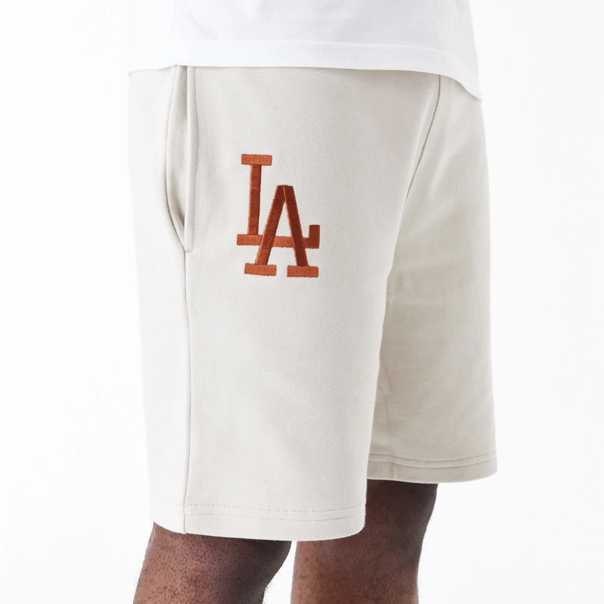 The Male model is wearing LA Dodgers League Essential Stone Shorts 4