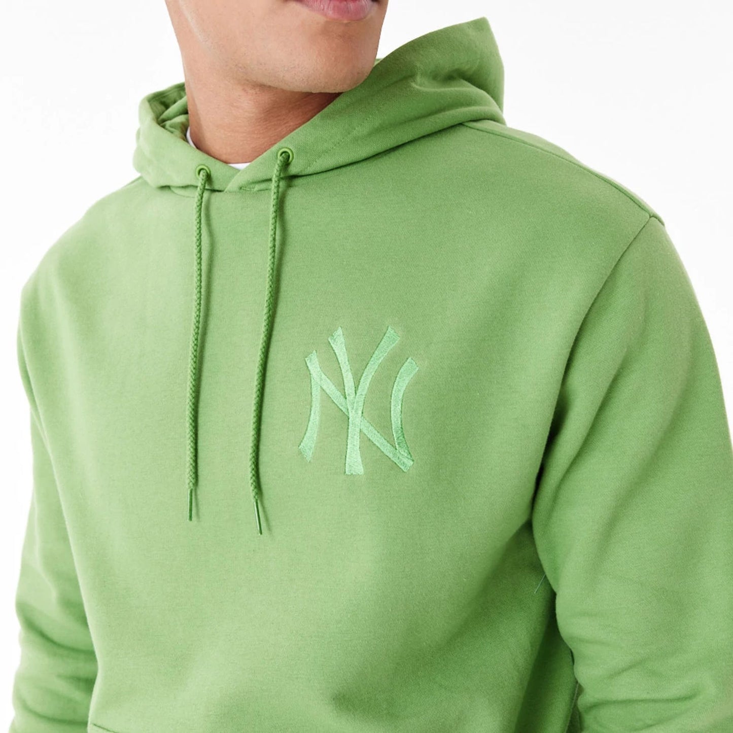 The Male model is wearing New York Yankees League Essential Green Oversized Pullover Hoodie 5