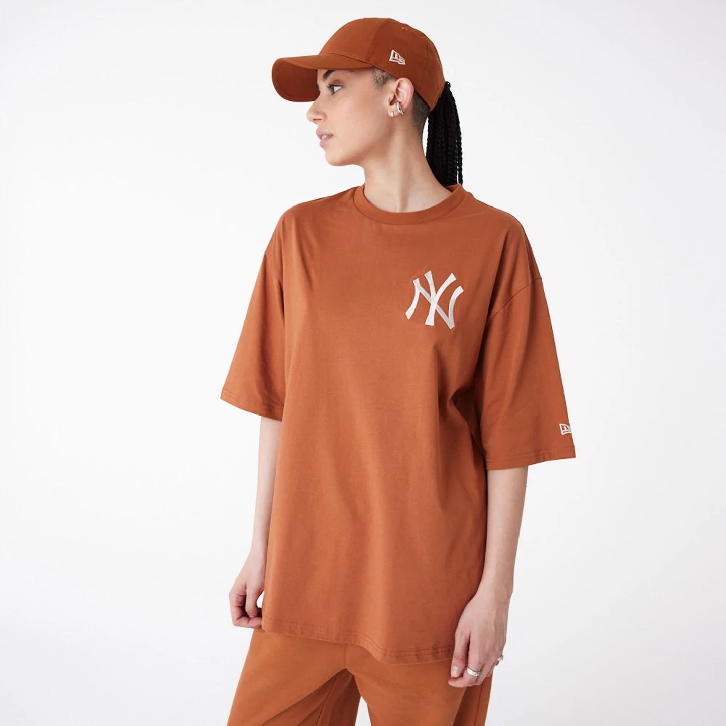 The Male model is wearing New York Yankees League Essential Brown Oversized T-Shirt 3